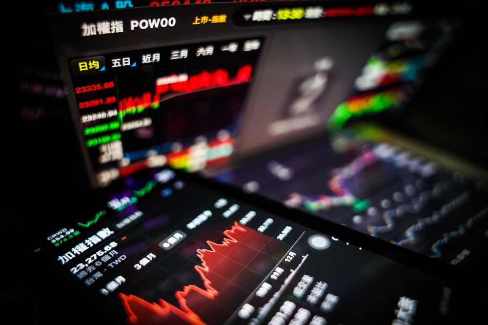 ETF今年受益人數暴增逾400萬。(圖/中央社)