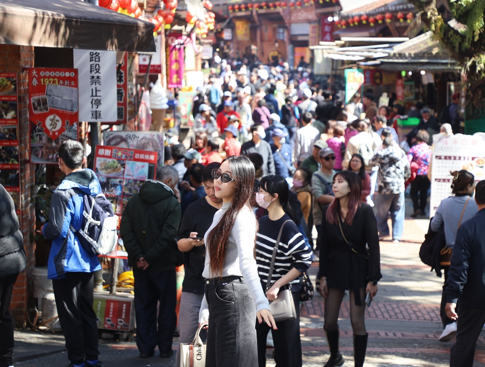 德媒點名台灣為亞洲移民理想國。(圖/ 中央社)